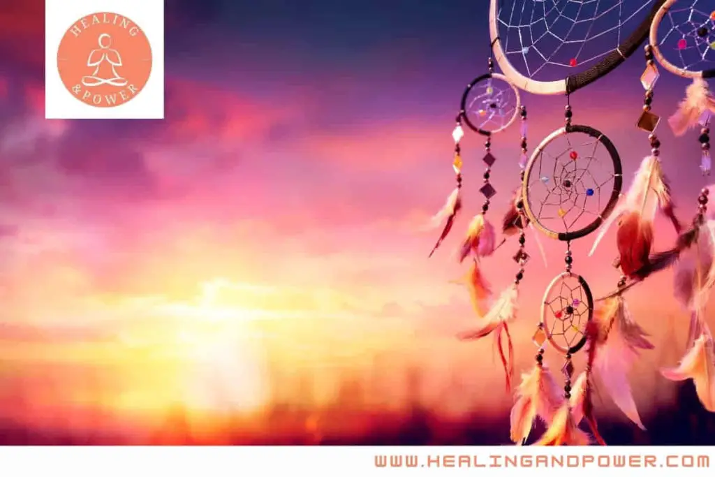 a dream catcher at sunset