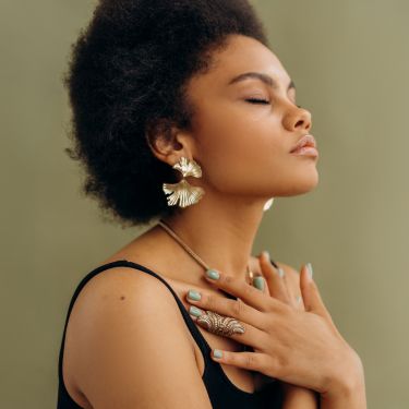 a woman calmly meditates